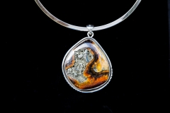 Fossil:  Ammonite with Pyrite and Calcite set in custom Sterling Silver Pendant.